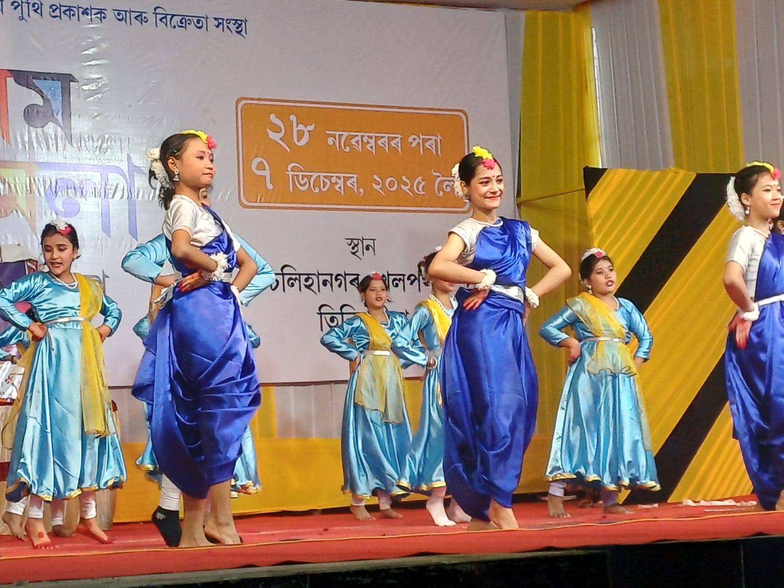 Group dance with blue and yellow stage costumes